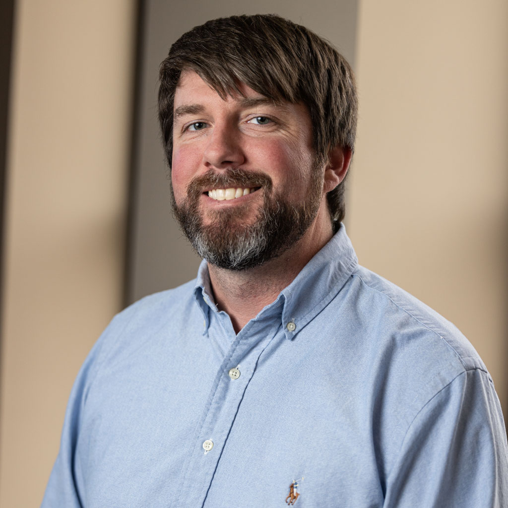 corporate headshot of young man