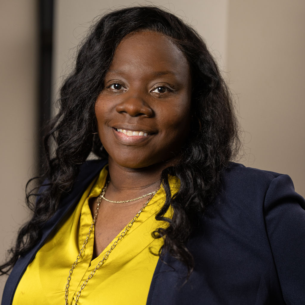 corporate headshot of middle-aged woman