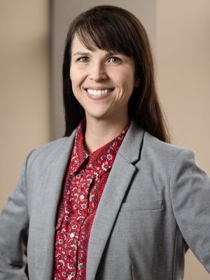 corporate headshot of young woman